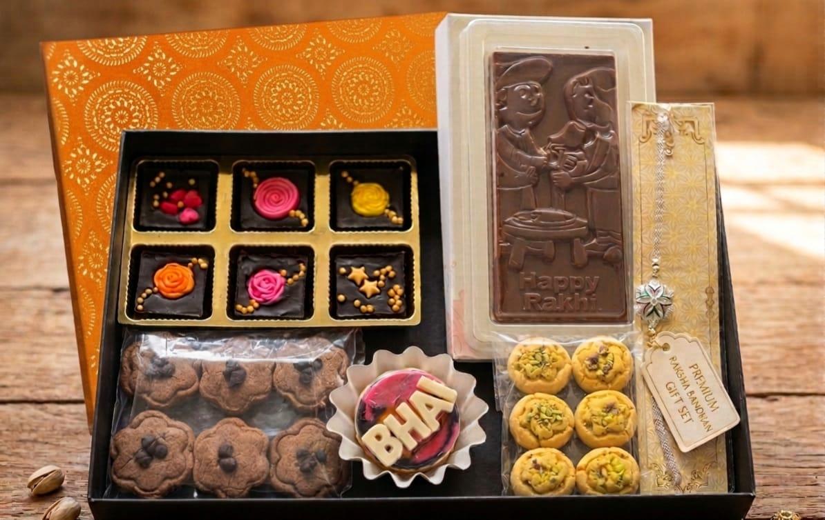 A festive chocolate hamper with handmade treats, rakhi and gift packaging
